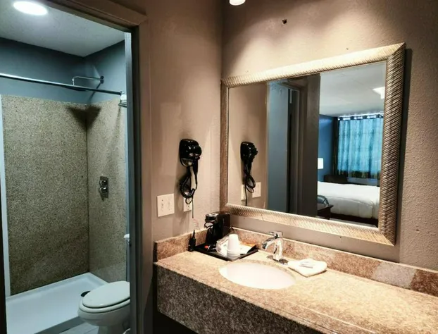 Executive Inn By OYO Queenville Mena hotel detail image 2