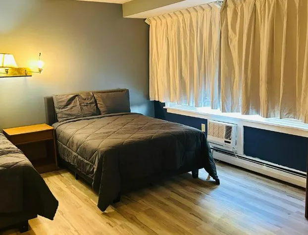 Capital O Swan Inn Comstock Park hotel detail image 3