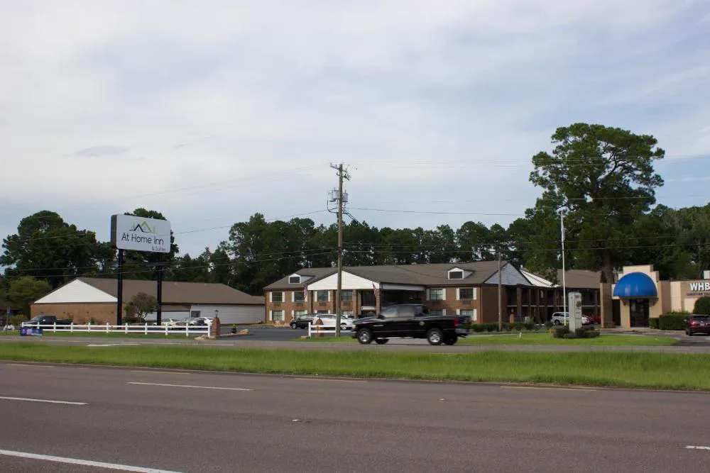 At Home Inn & Suites hotel hero