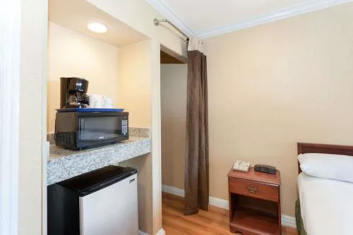 Om park inn and suites hotel detail image 1