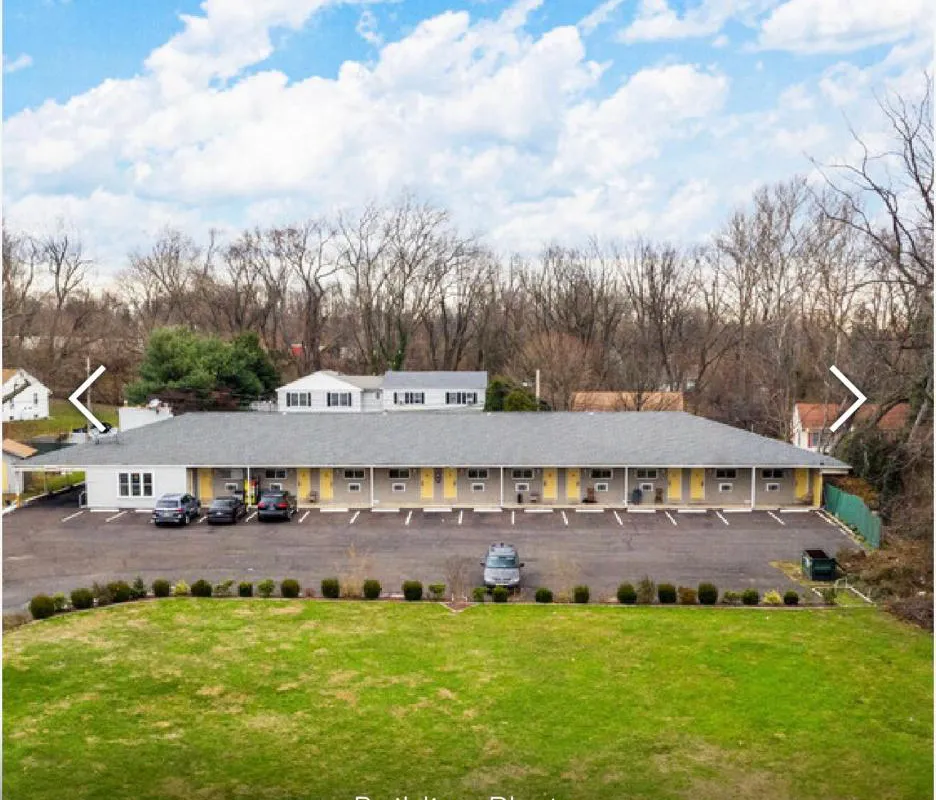 Scottish Inn and Suites hotel hero