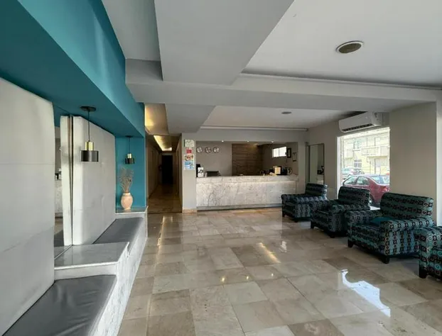 Impala Hotel in front of the ADO hotel detail image 3