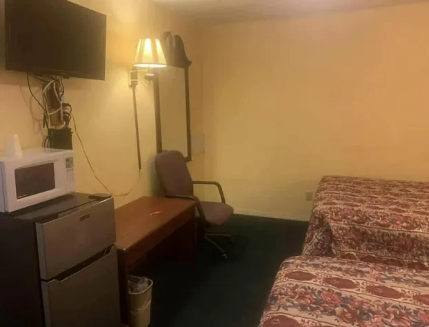 Economy INN poteau hotel detail image 1