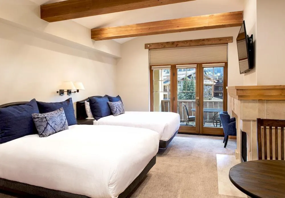 Hotel 2 Queen Hotel Room by RedAwning hotel hero