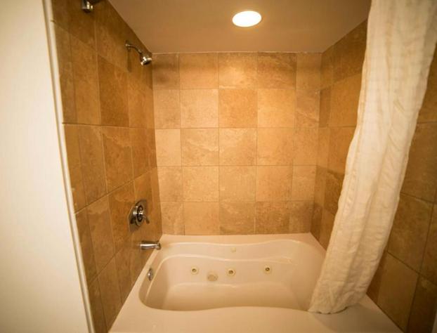 Deluxe Ocean front One Bedroom suite in Sandy Beach Resort hotel detail image 4