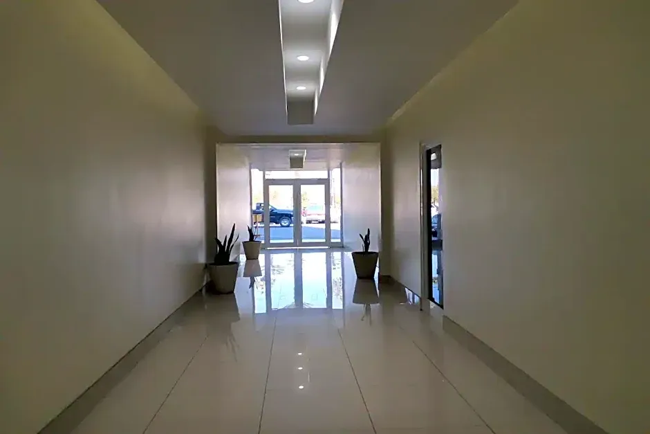 Capital O Baja Place Inn hotel hero