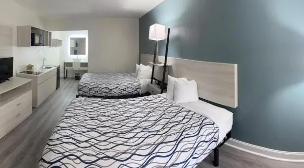 Magnolia Inn Extended Stay of Kingsland - New 2024 - Book a Kitchen Room - 12 Noon Check Out - Sleep In Late - Better Sleep - Ultra Sparkling - Pool open until until 4AM - Stay and Save Today - 24 Hour Front Desk - Premium Coffee Bar - Award Winning Inn hotel detail image 4
